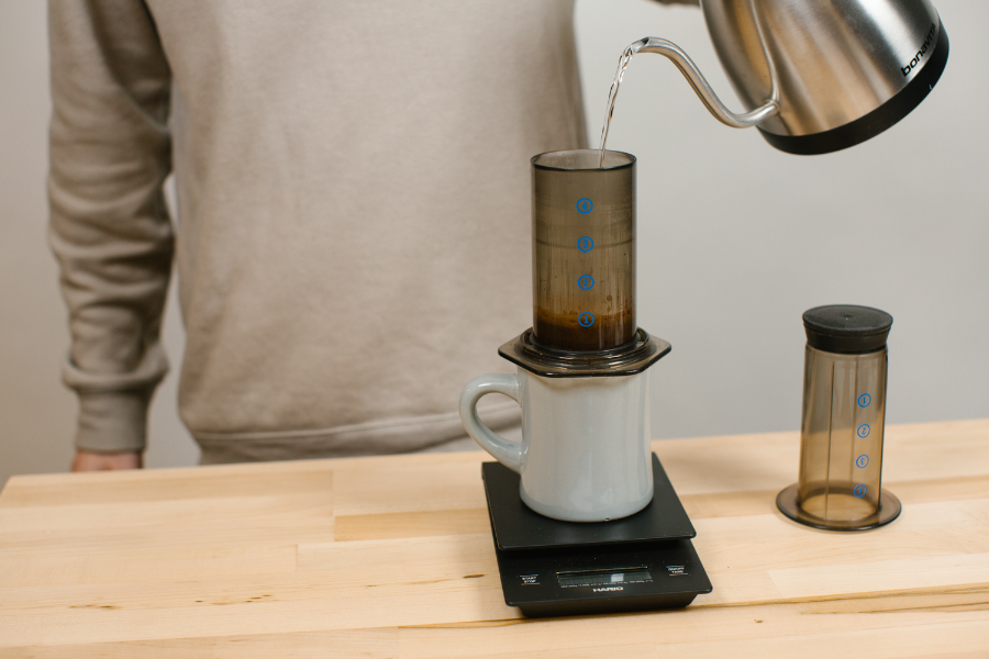 Image of kettle pouring water into Aeropress.
