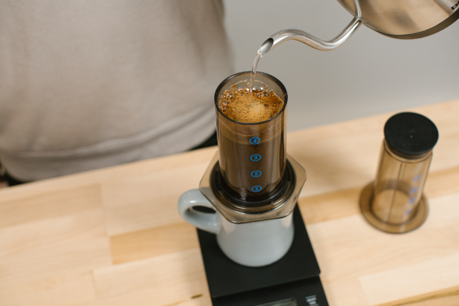 Image of water pouring into Aeropress.
