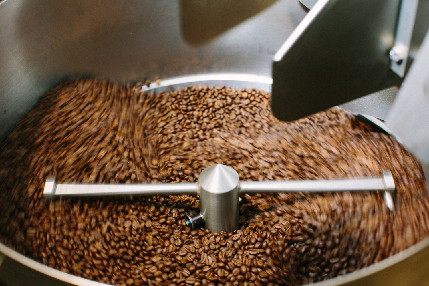 Image of coffee in cooling bin.