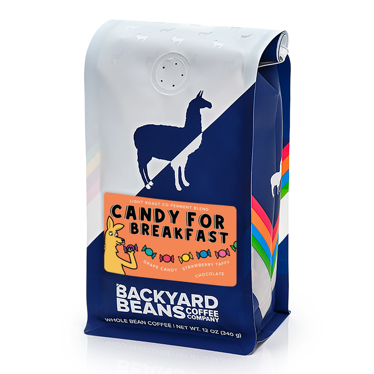 A bag of Backyard Coffee Company 'Candy for Breakfast' whole bean coffee. The packaging features a white top section with a dark blue silhouette of a llama, a central orange label with candy graphics, and a dark blue bottom section with white text.
