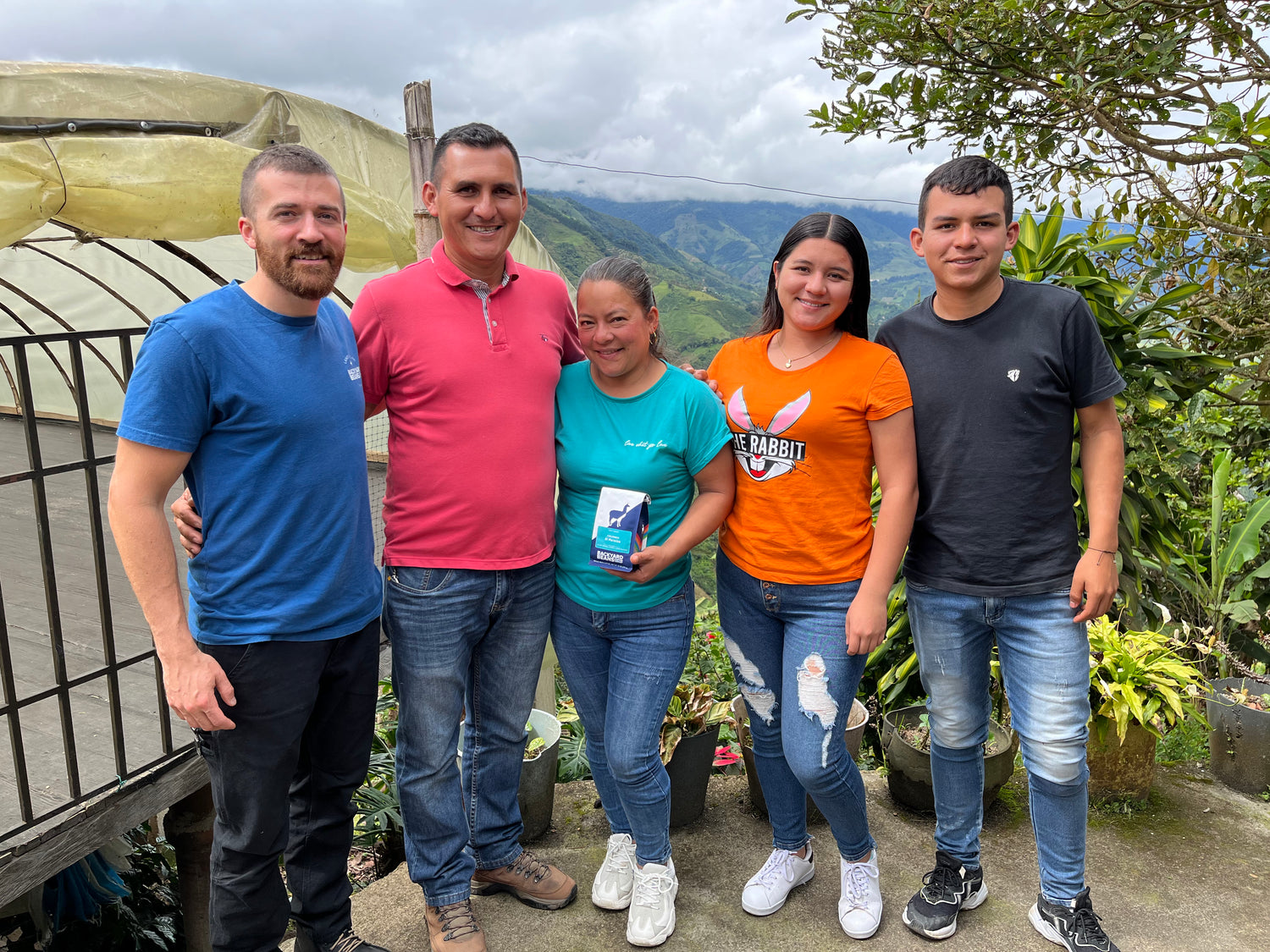 Image of Director of Coffee Bobby with Rodriguez family at their Colombia farm.