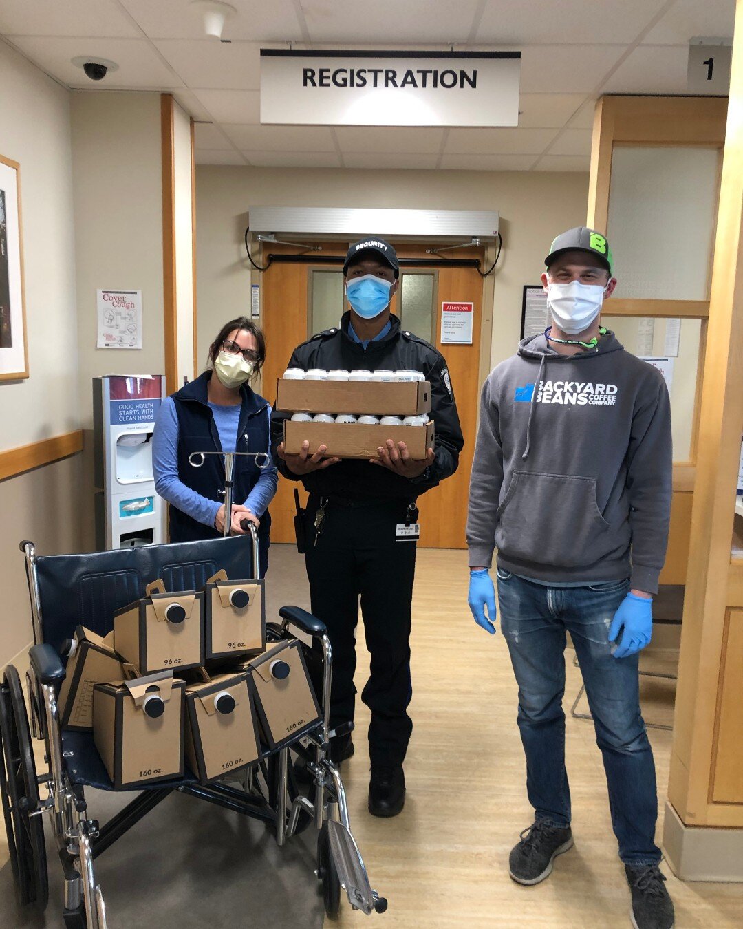 Image of Matthew Adams with coffee donations inside Hospital.