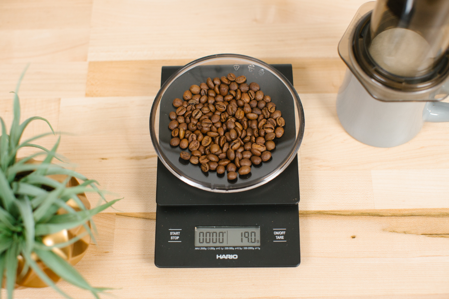 Image of coffee beans on coffee scale.