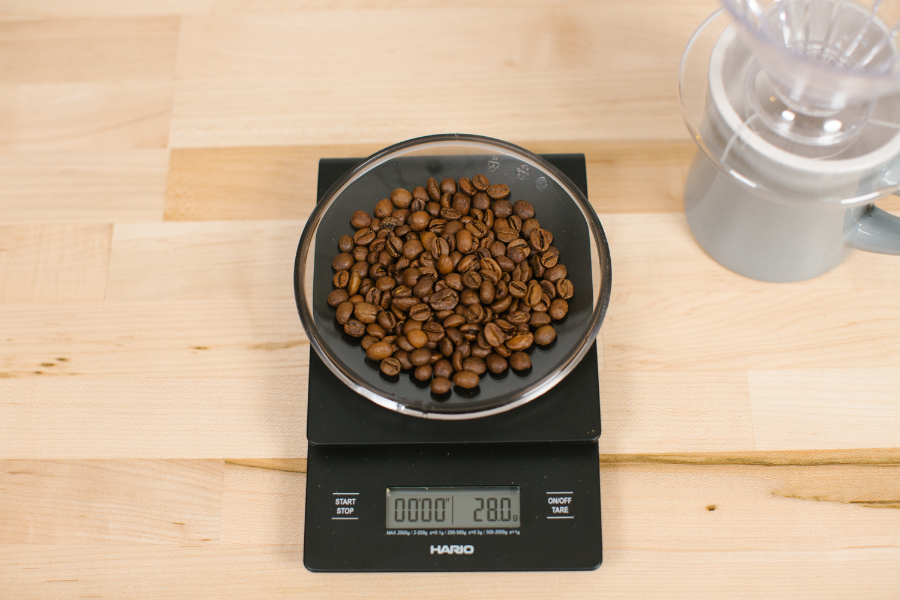 Image of 28g of coffee measured out.