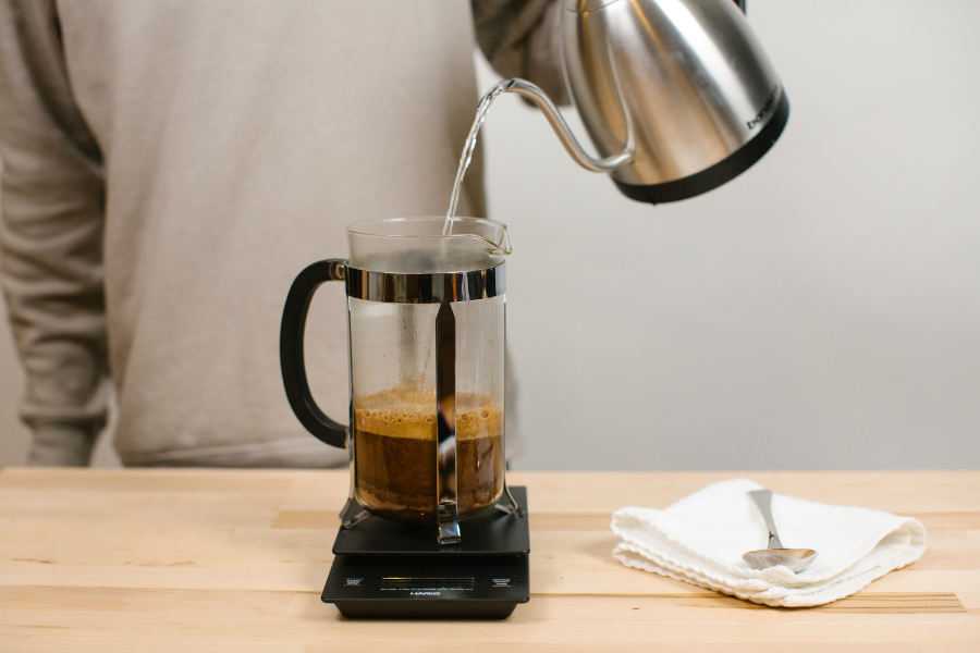 Image of kettle pouring water into French Press.