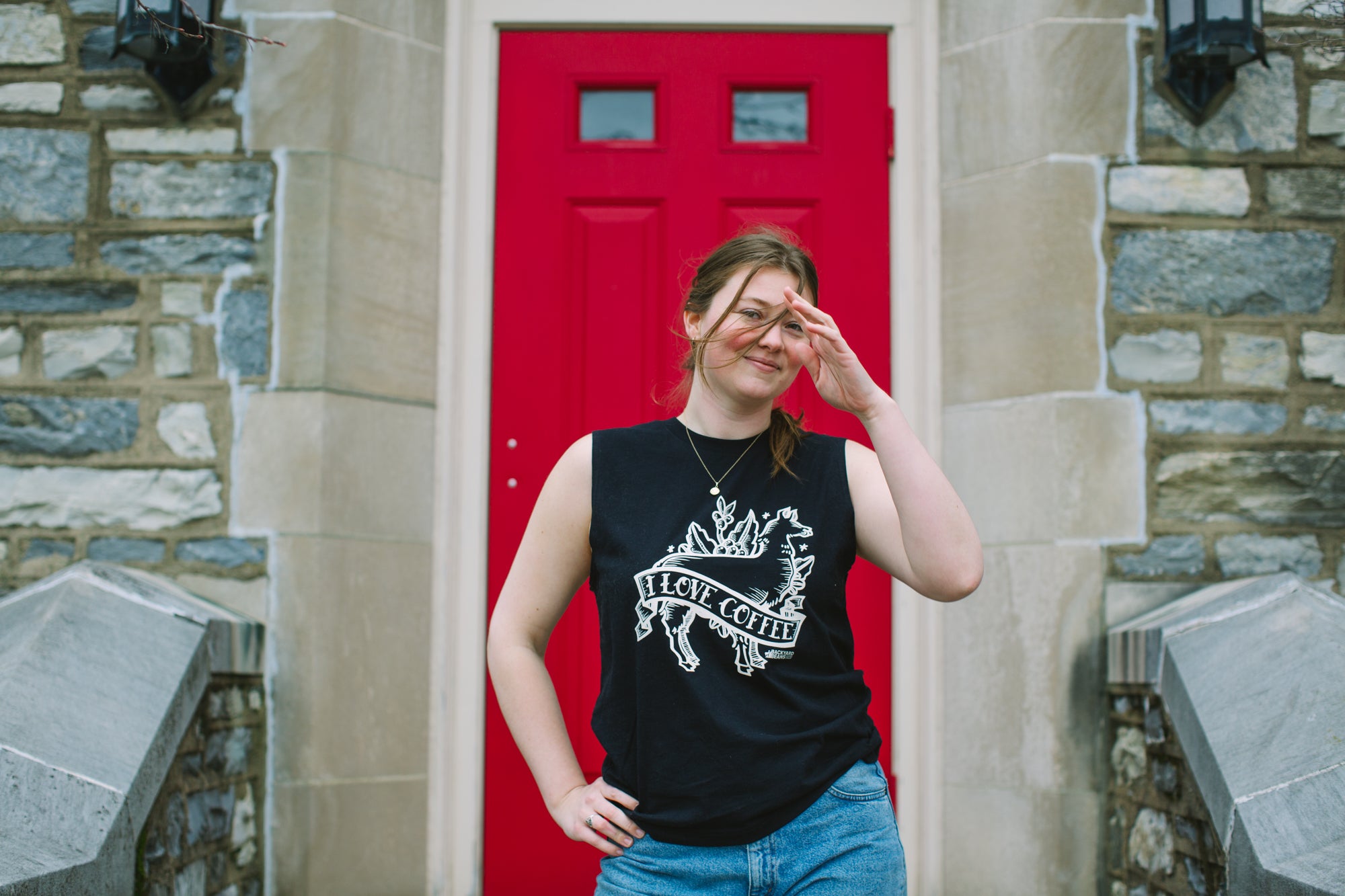 Image of woman wearing I Love Coffee tank.