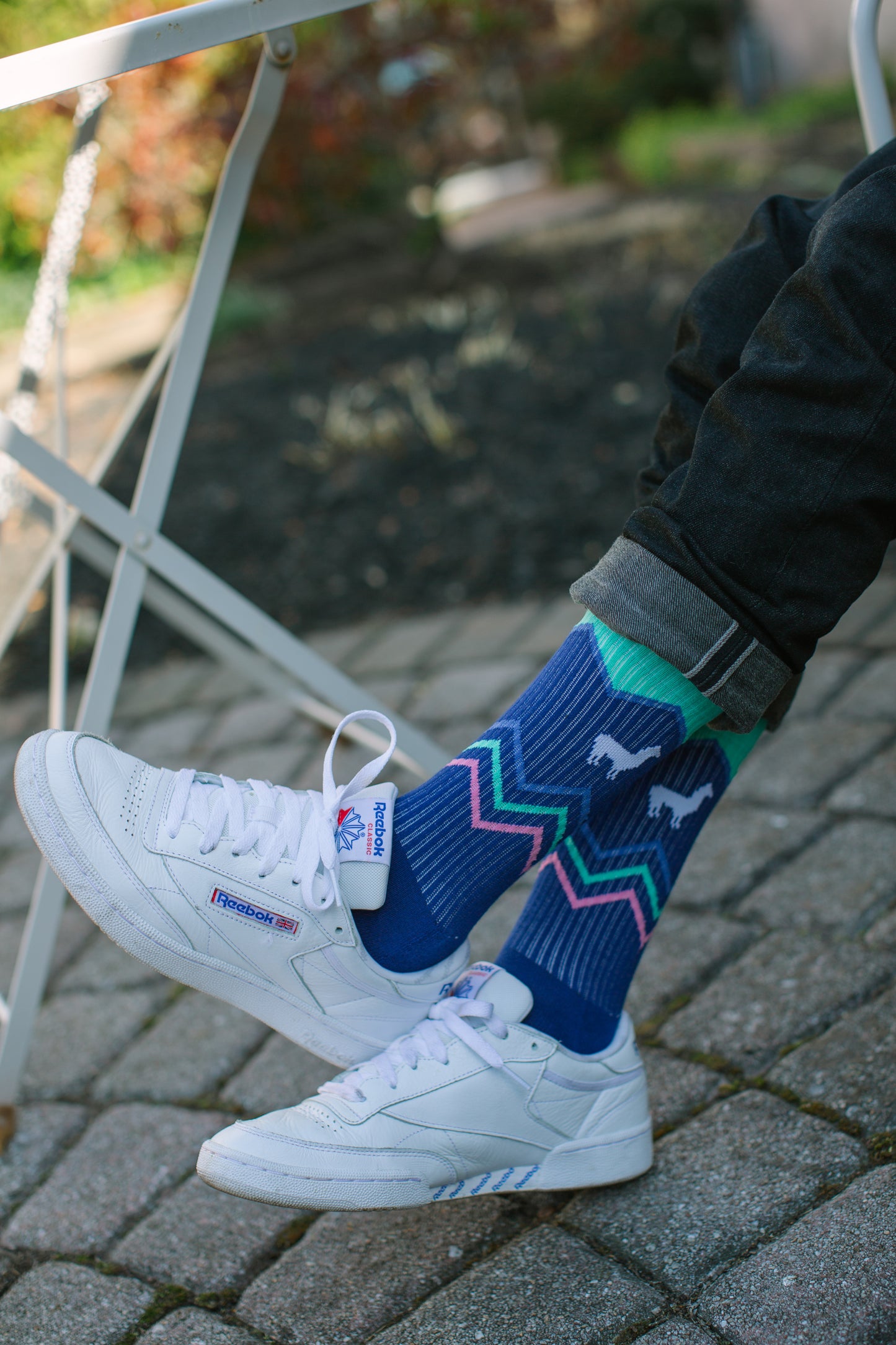 Image of model wearing llama socks.