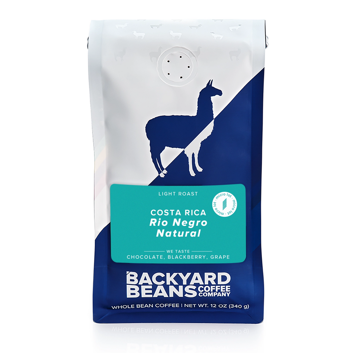 A 12 oz bag of Backyard Beans Coffee Company Costa Rica Rio Negro Natural light roast coffee. The packaging features a white and navy blue design with a silhouette of a llama and a teal label in the center.