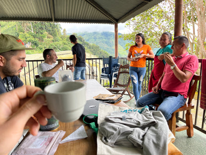 image of our visit drinking coffee with the famliy