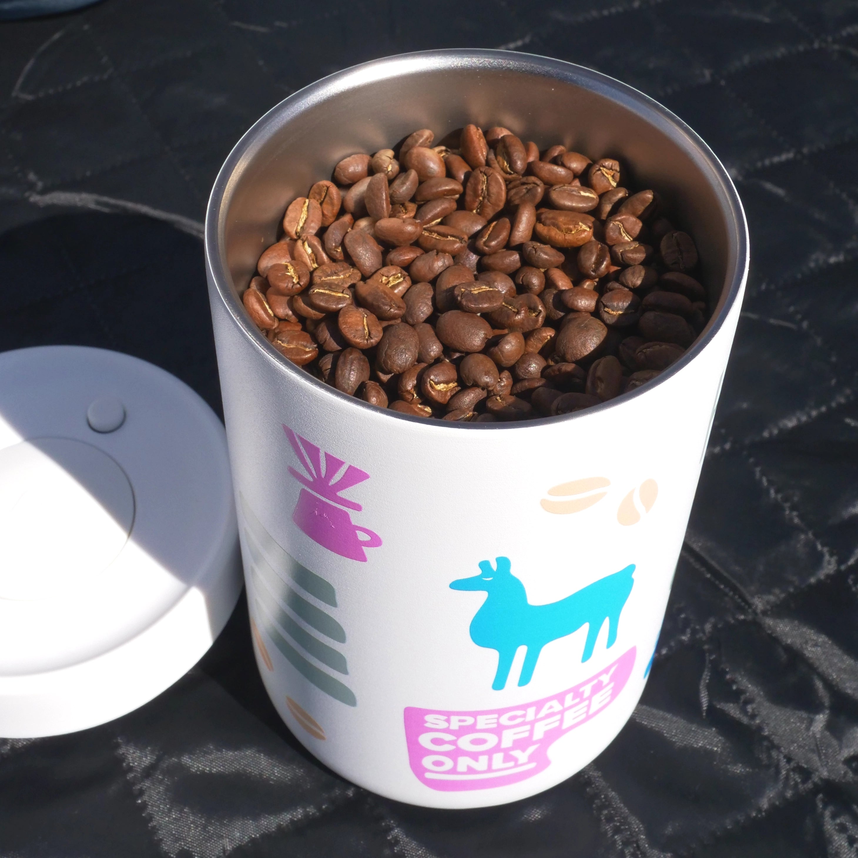 Image of coffee beans in spring limited edition reserve canister