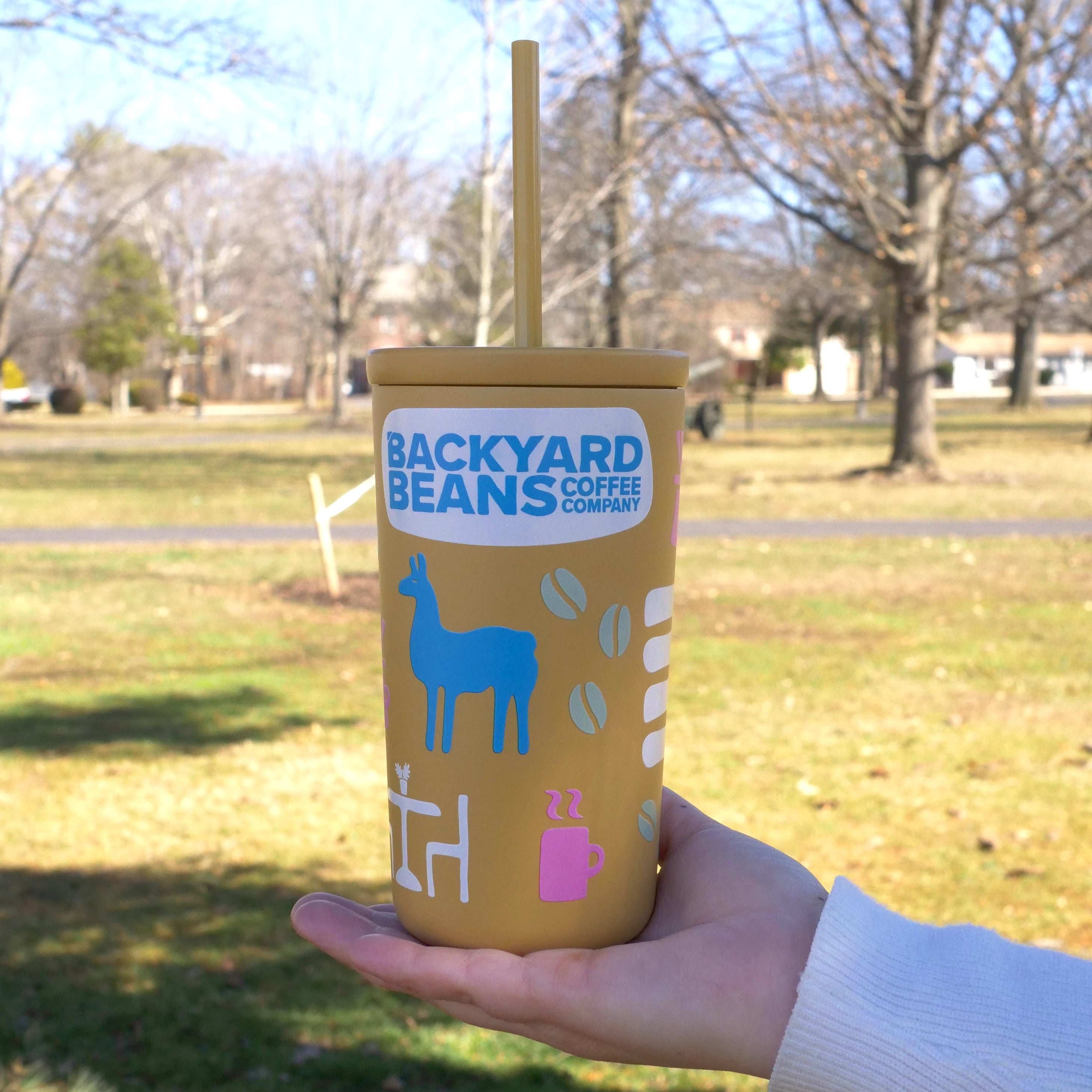 Image of Backyard Beans yellow cold cup with limited edition spring design
