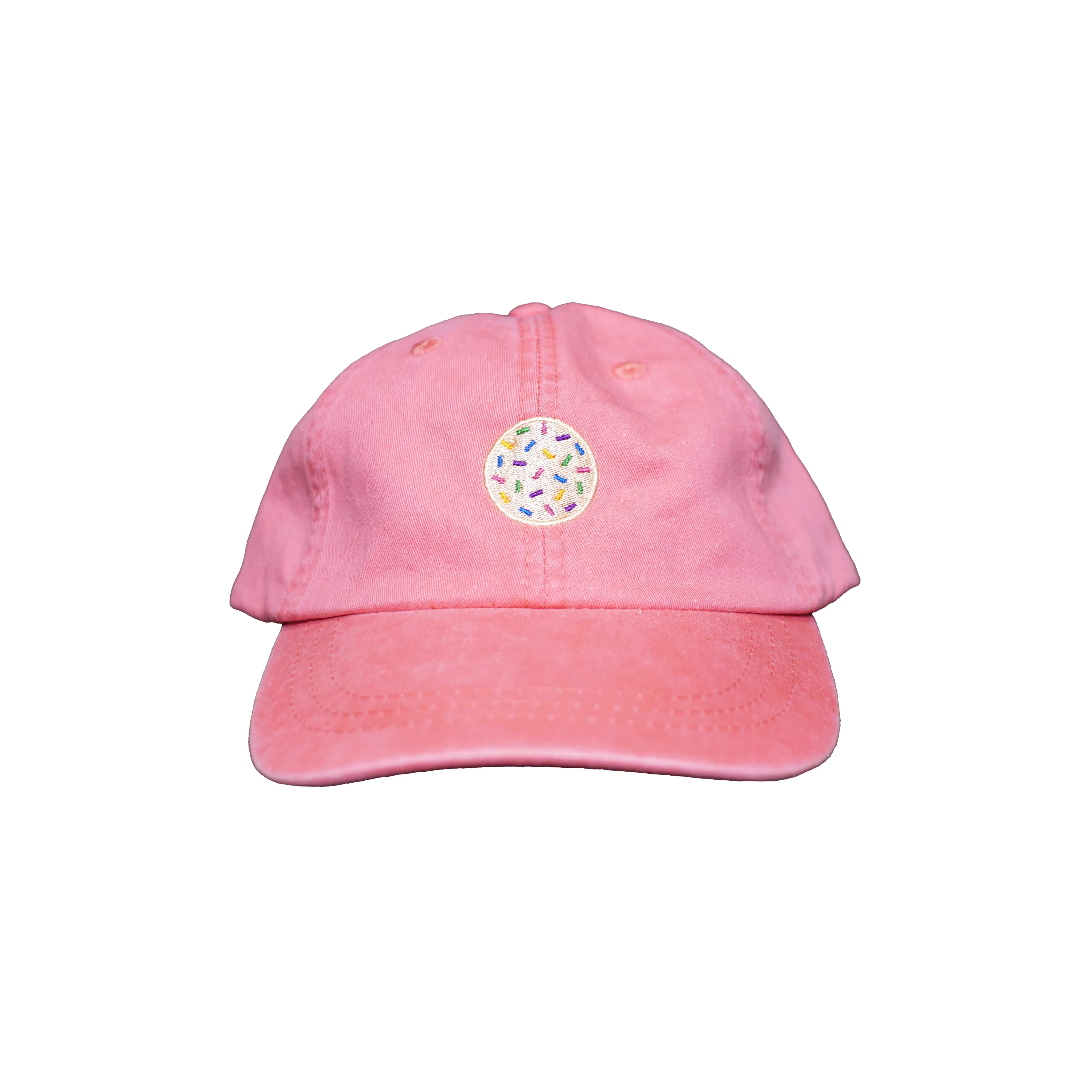 Image of coral dad hat with embroidered sprinkle cookie