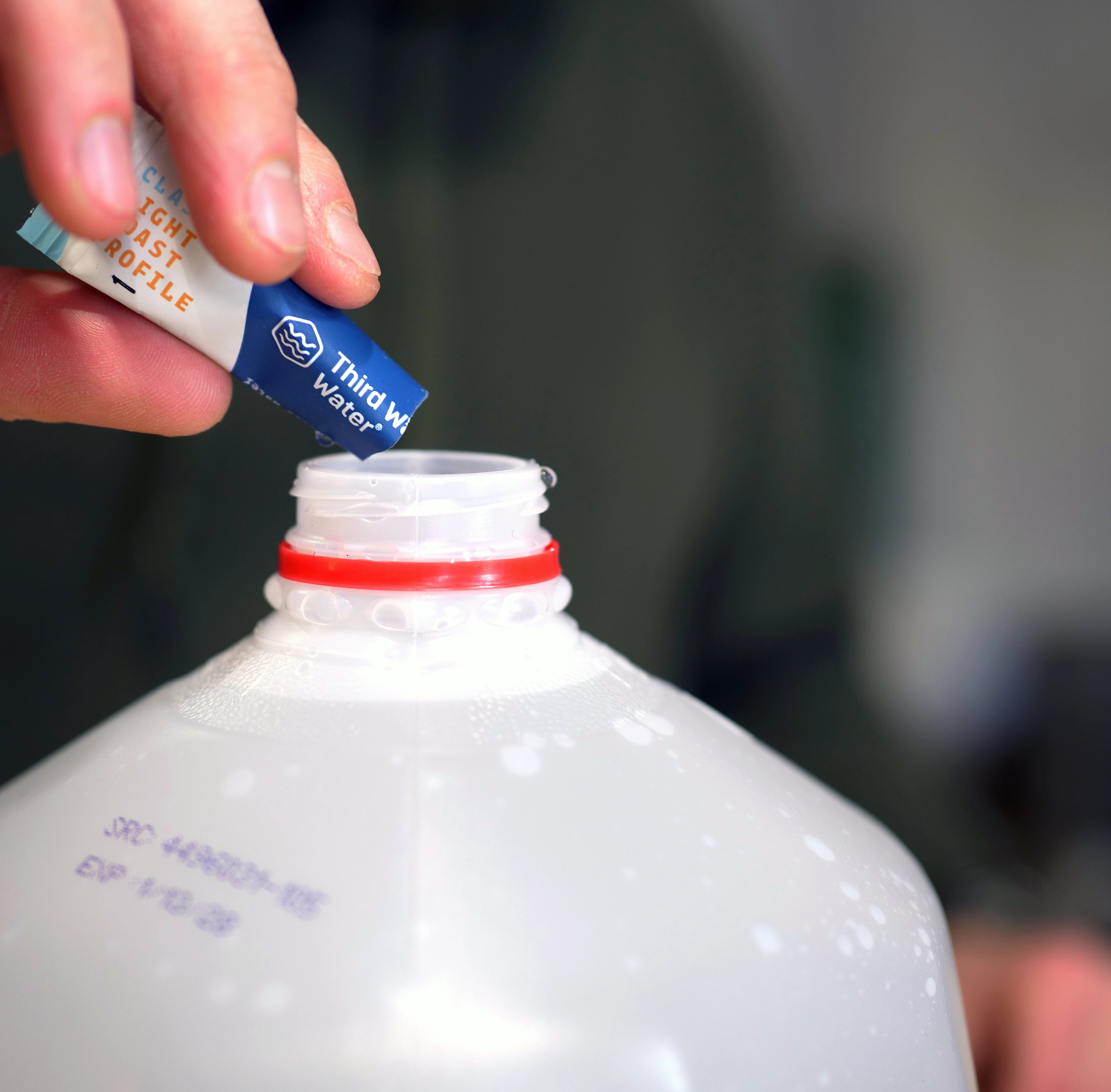 Image of Third Wave Water packet and distilled water