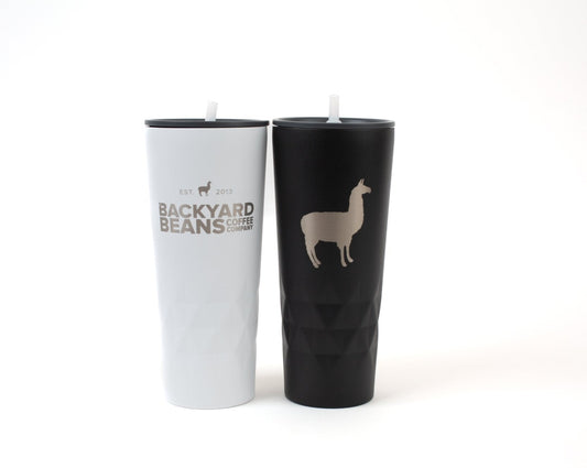 Image of white and black tumblers with straws