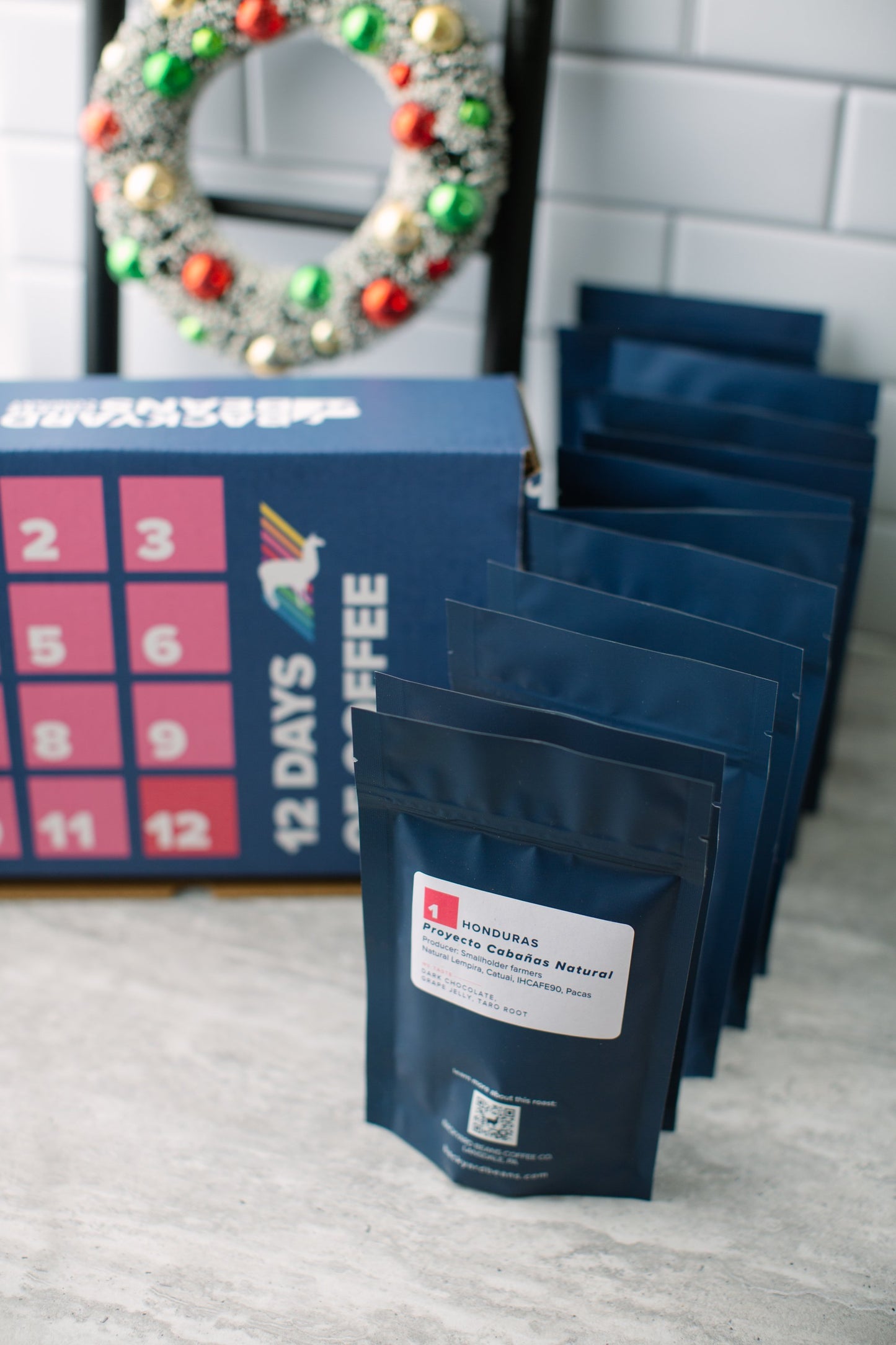 Image of 12 Days of Coffee box and coffee bags.